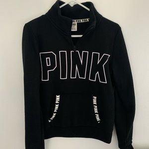 PINK quarter zip sweatshirt.